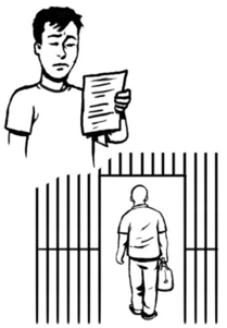 A man reading a letter about a man being released from prison